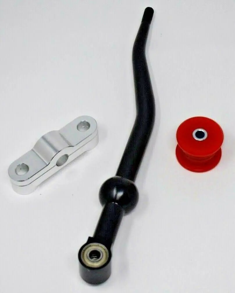 Dual bend short shifter from Jack Spania Racing with poly billet D-series shift linkage bushings for Honda Civic transmission.