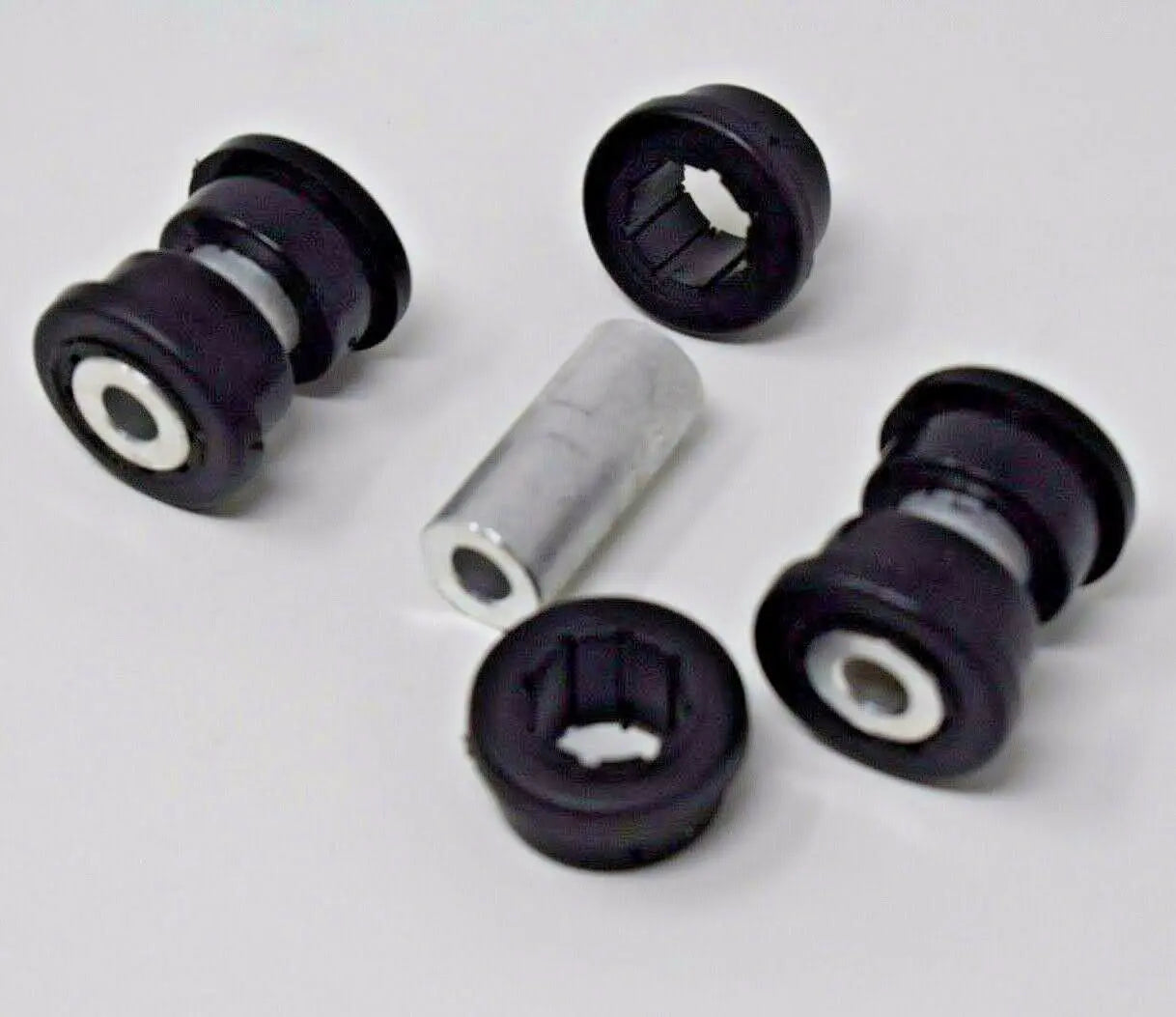Jack Spania Racing replacement bushings with inserts for Skunk2 EG EK DC lower control arm suspension parts.