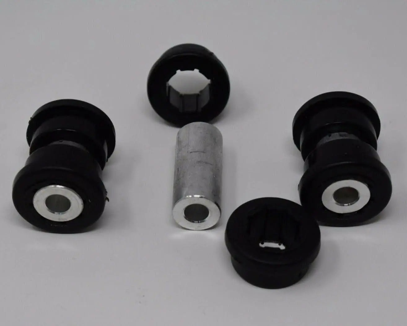 Jack Spania Racing replacement bushings with inserts for Skunk2 EG EK DC lower control arm suspension parts, detailed view of the components