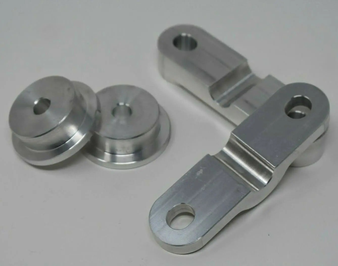 CNC billet aluminum shifter bushings for Honda EK, EG, EF D-Series single cam D15 D16 transmission by Jack Spania Racing