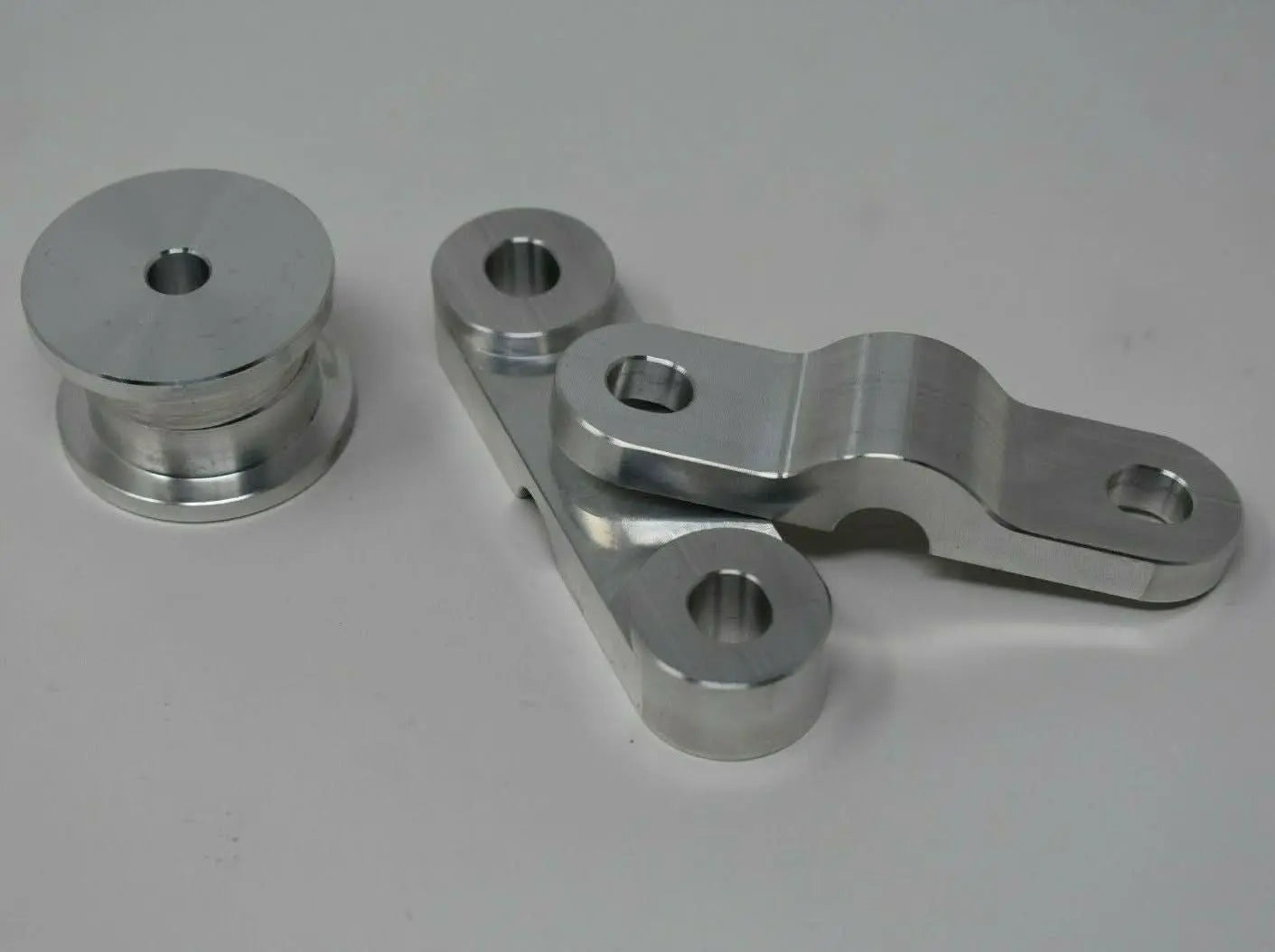 CNC billet aluminum shifter bushings for Honda EK, EG, EF D-Series single cam D15 D16 transmission by Jack Spania Racing