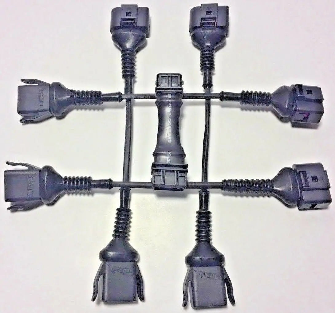 Audi 2.0T FSI coil conversion harness with ICM delete CNC plates for 97-99.5 B5 A4 1.8T engine, by Jack Spania Racing.