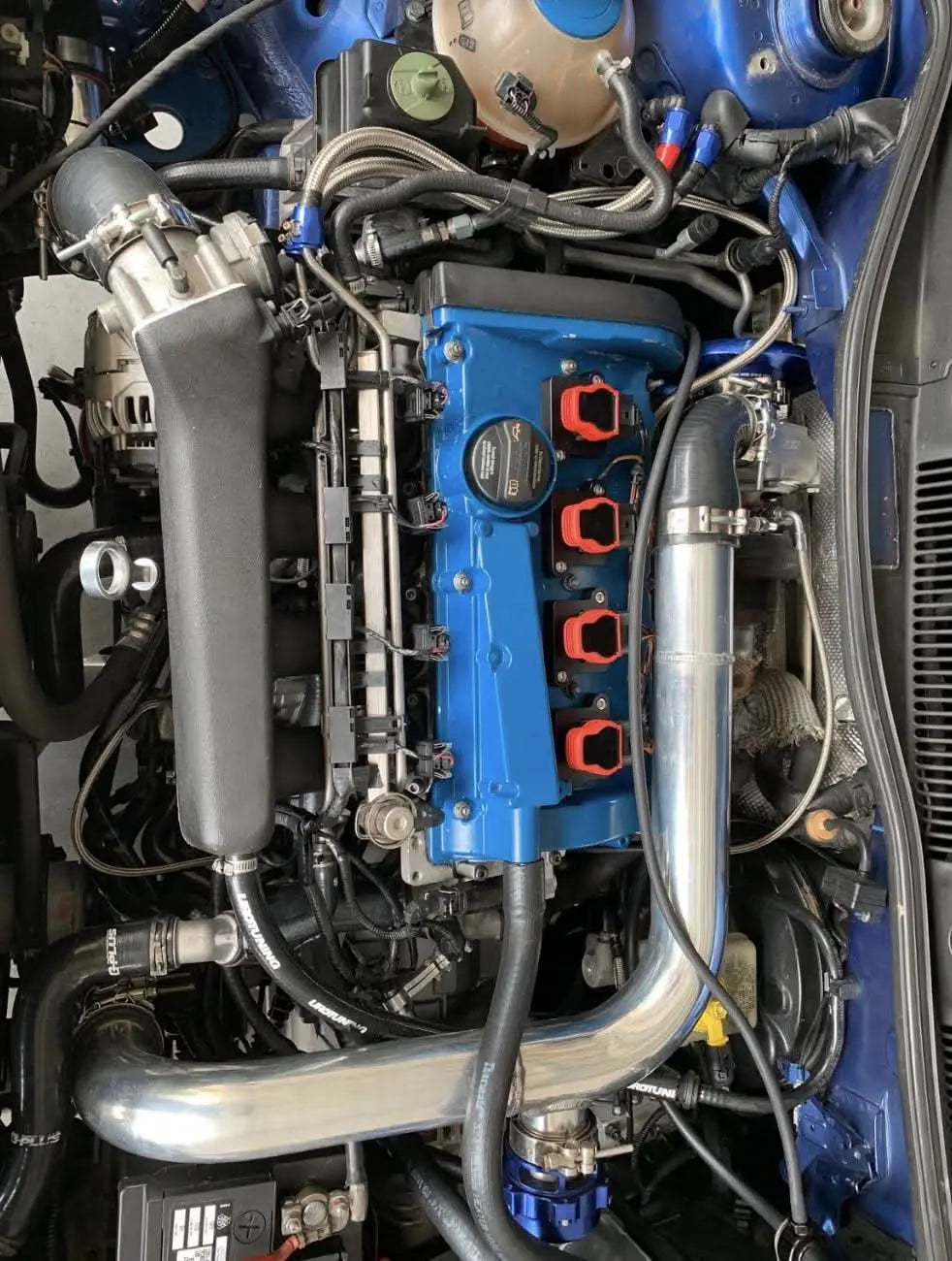 Audi 2.0T coil conversion ICM bypass kit with R8 coilpack plates for 97-99.5 B5 A4 1.8T engine, by Jack Spania Racing.