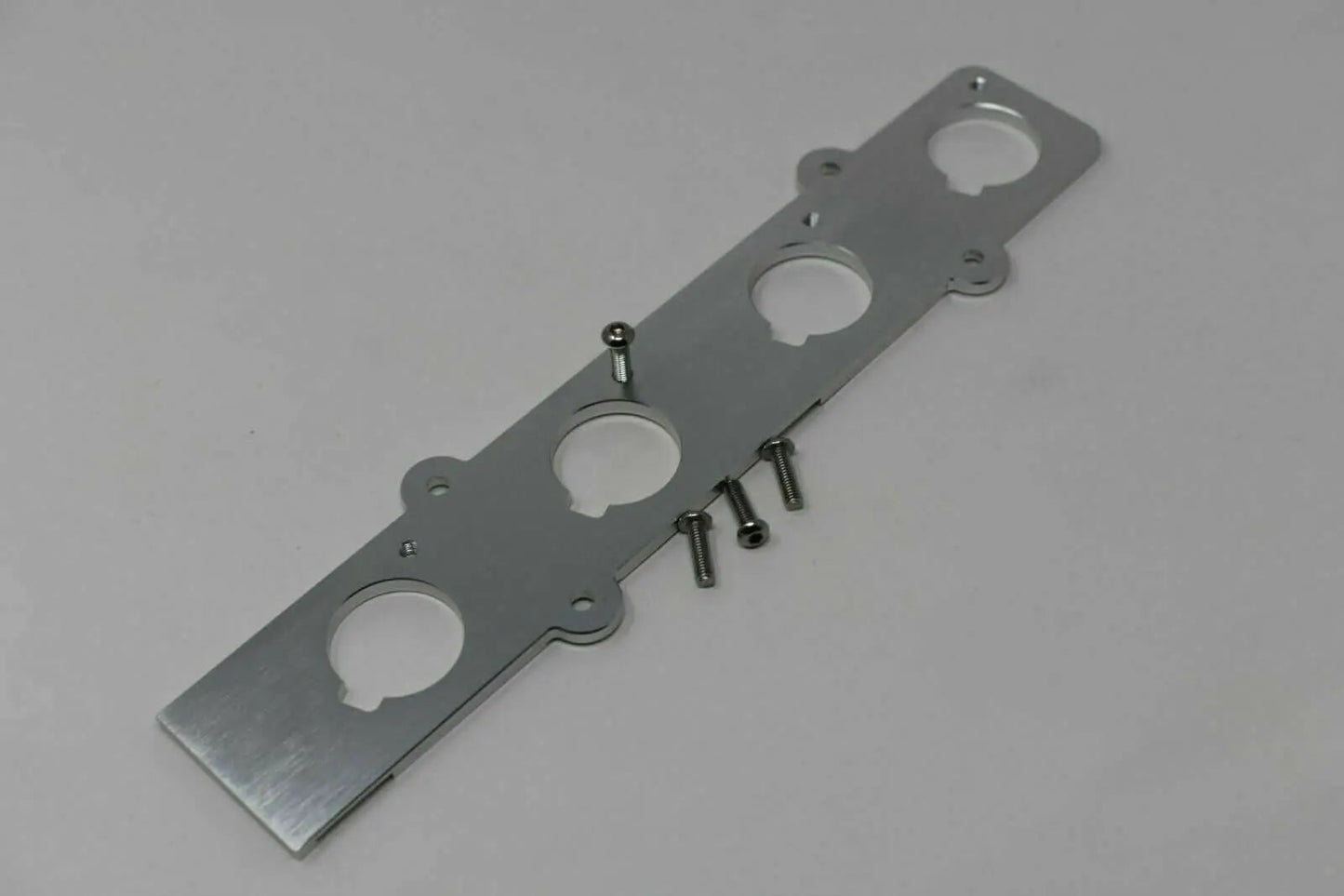 Jack Spania Racing B Series Coil On Plug (COP) adapter plate for Honda Acura B16 B18 engine coil conversion.