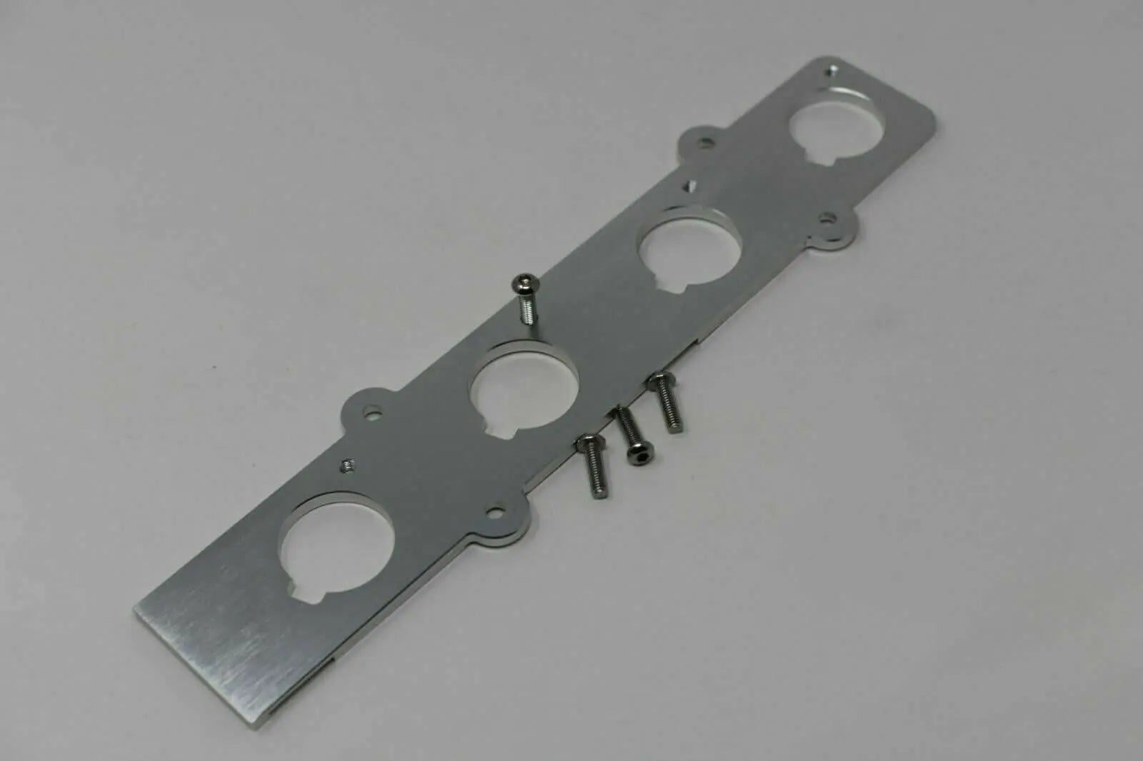 Jack Spania Racing B Series Coil On Plug (COP) adapter plate for Honda Acura B16 B18 engine coil conversion.