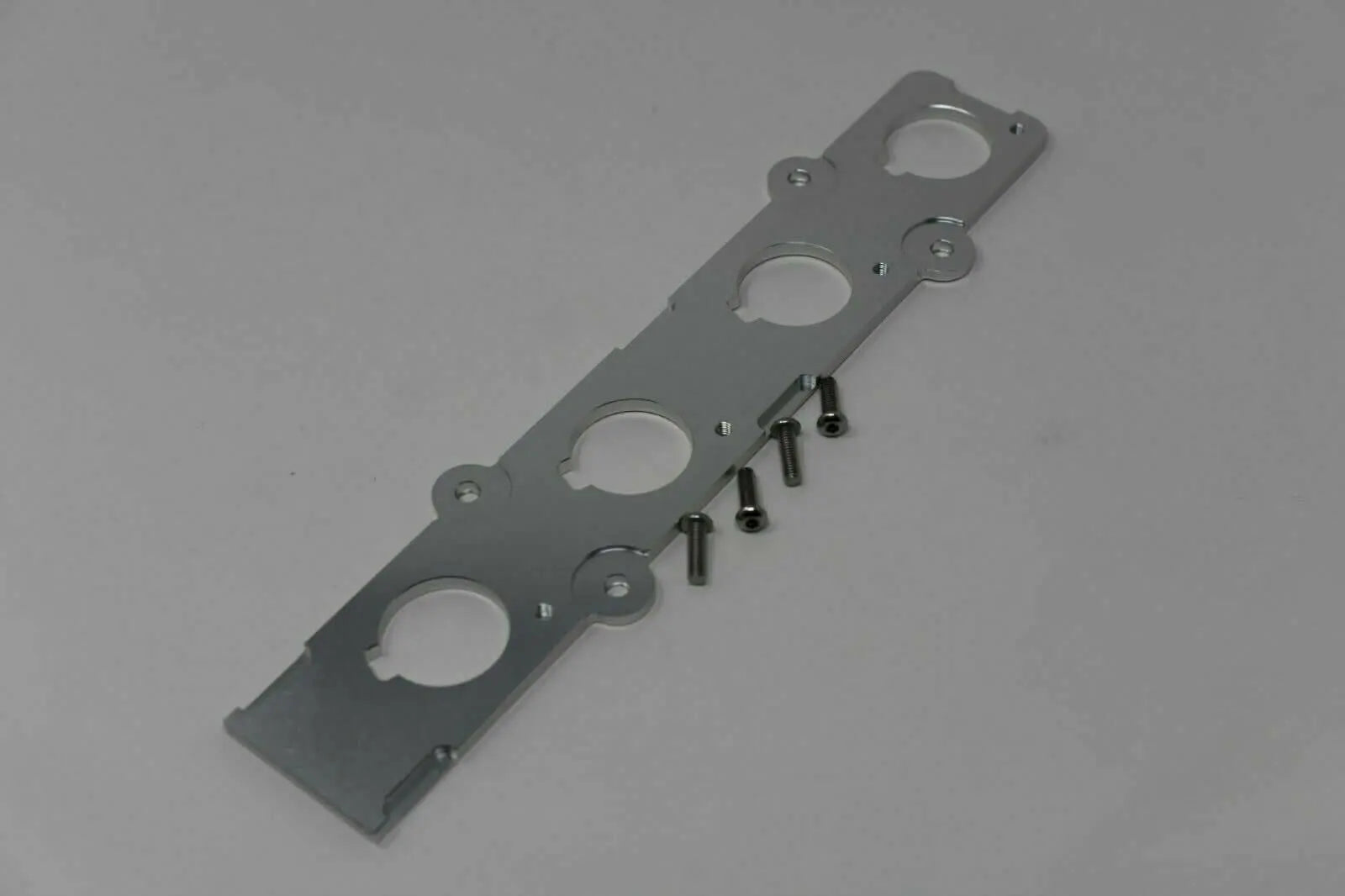 Jack Spania Racing B Series COP adapter plate for Honda Acura B16 B18 engines, engine part for coil-on-plug conversion.