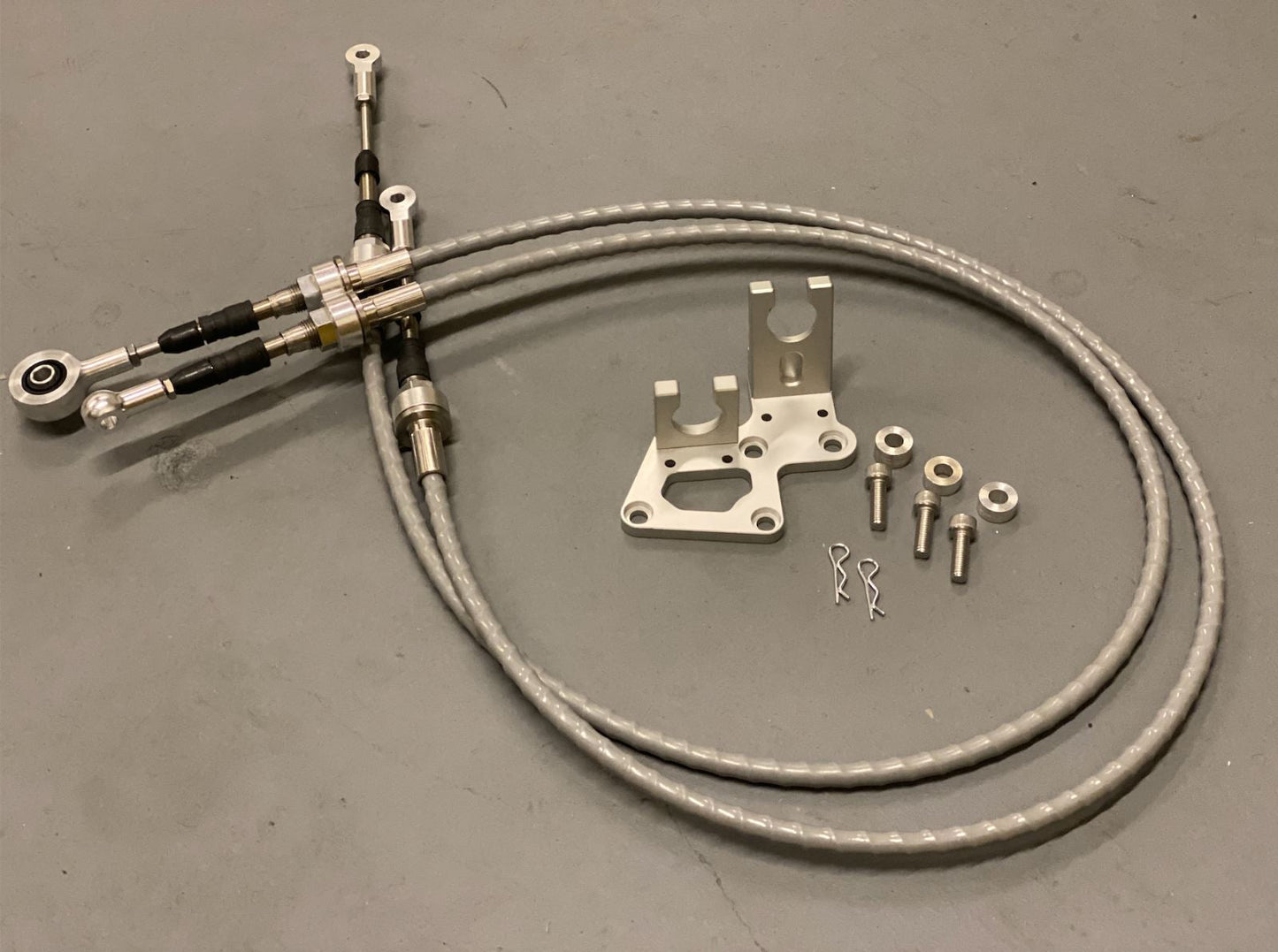 Jack Spania Racing RSX shifter cables and transmission bracket for K20, K24, and K swap series in EG, EK, DC2 race cars.