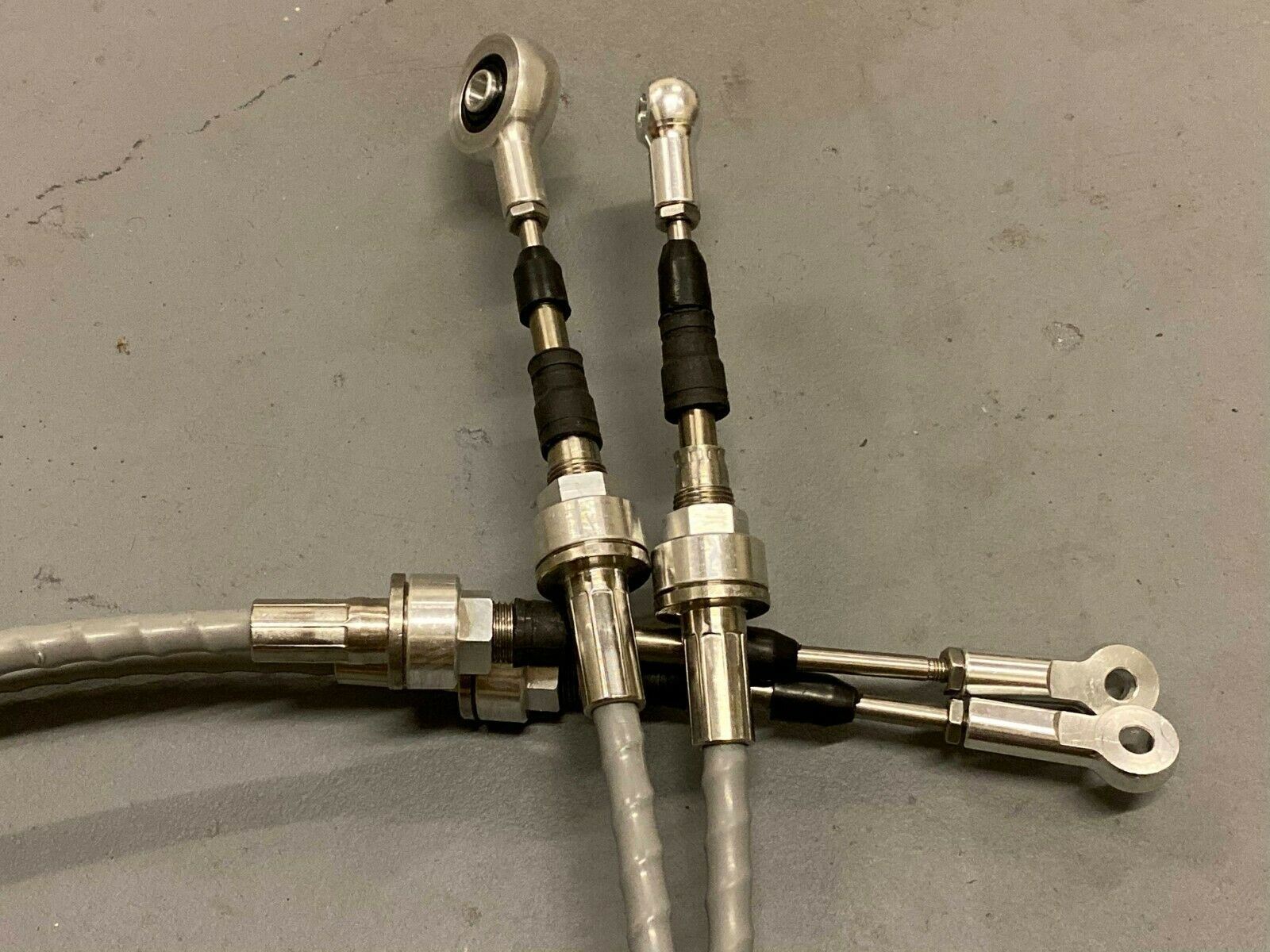 Jack Spania Racing RSX shifter cables and transmission bracket for K20, K24, EG, EK, DC2 series Honda race cars.