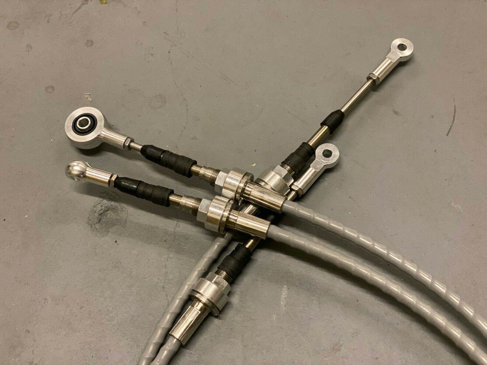 Jack Spania Racing RSX shifter cables and transmission bracket for K20, K24, and K swap series, compatible with Honda EG, EK, DC2.