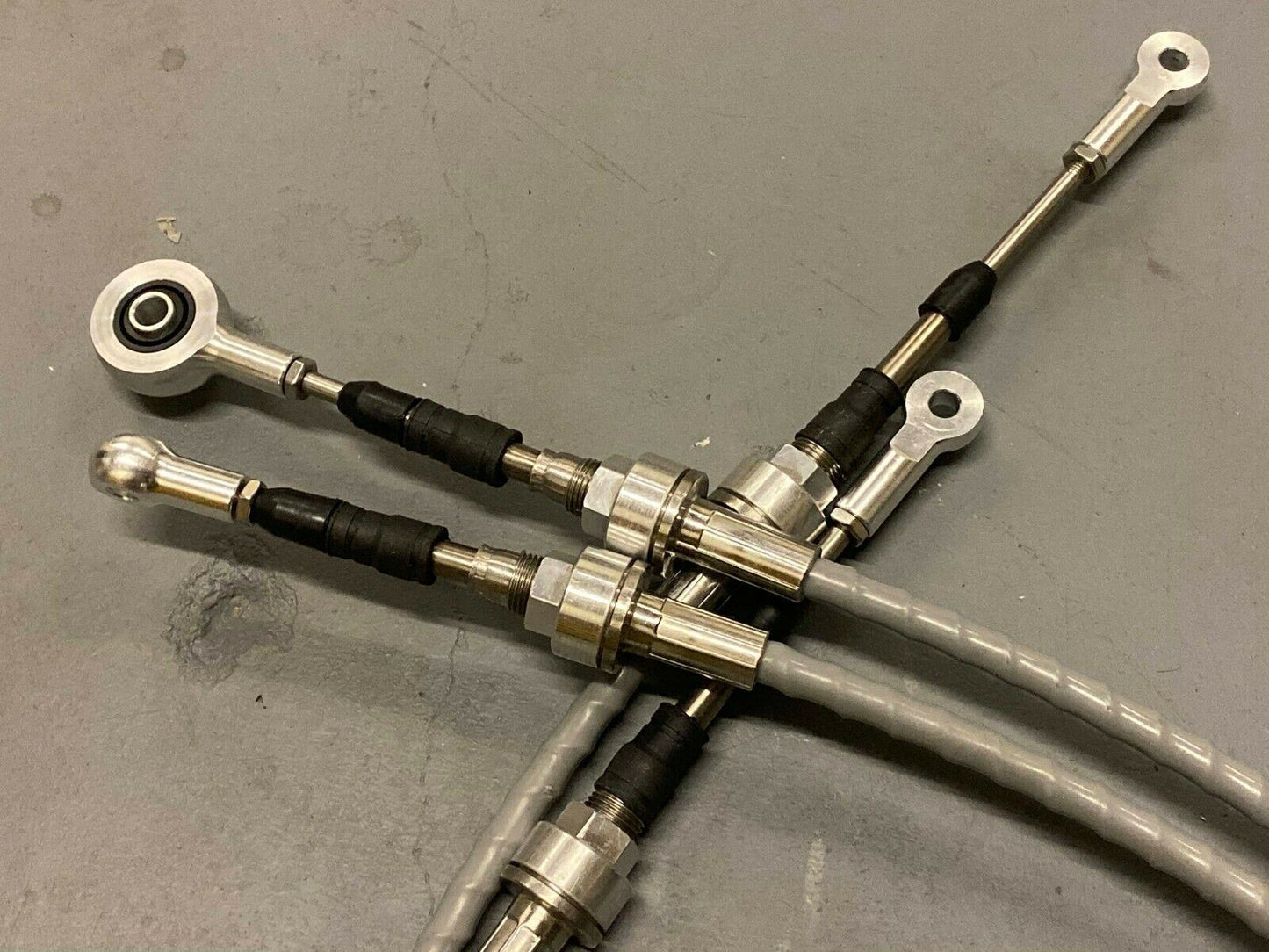 Jack Spania Racing RSX shifter cables and transmission bracket for K20, K24, and K swap series on Honda EG, EK, DC2.