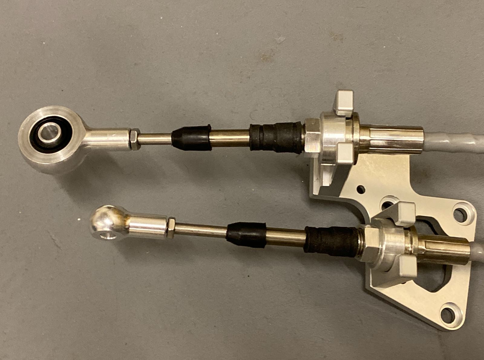Jack Spania Racing RSX shifter cables and transmission bracket for K20, K24, and K swap series on Honda EG EK DC2.