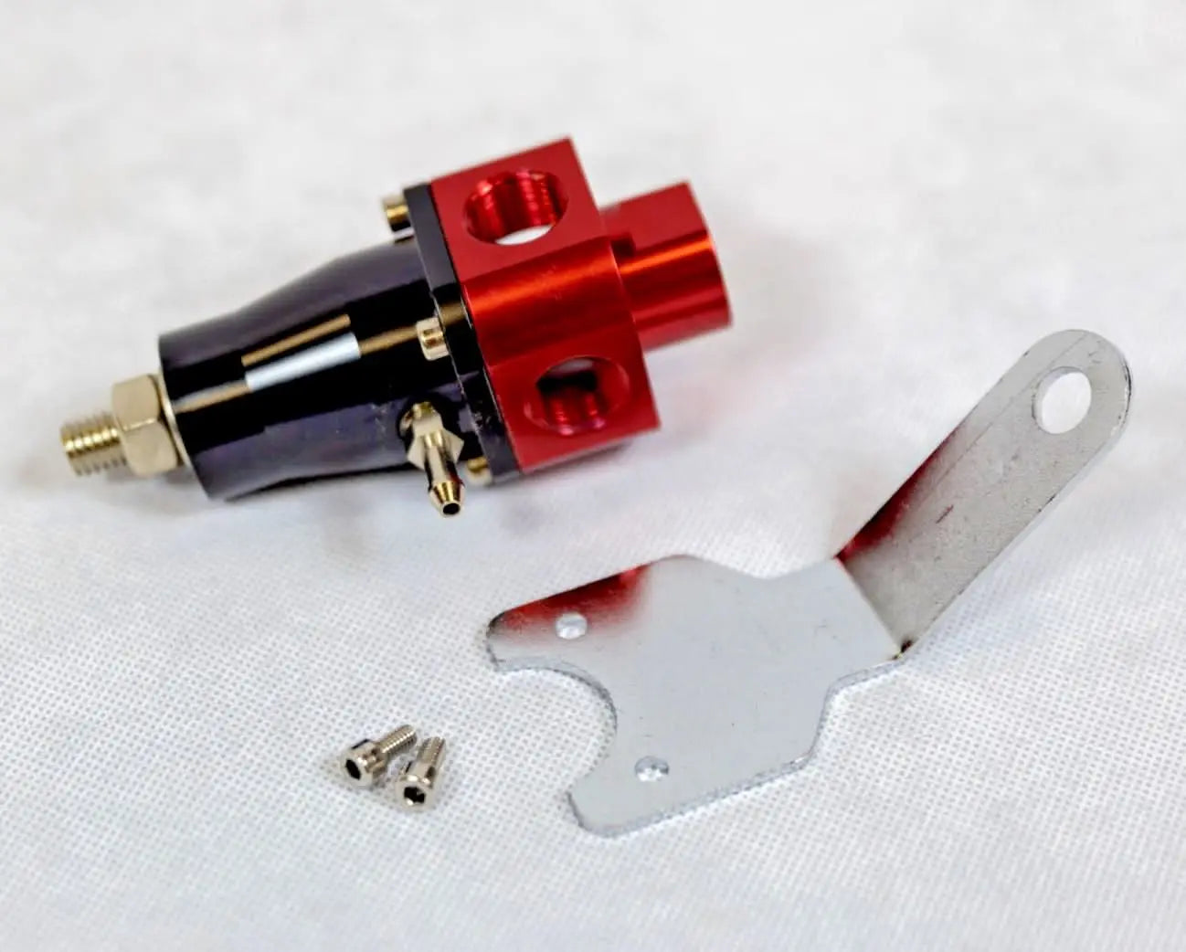 Jack Spania Racing EFI adjustable fuel pressure regulator with 3/8 NPT ports, billet aluminum body, and 3-60 PSI gauge for engine tuning