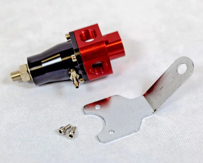 Jack Spania Racing EFI adjustable fuel pressure regulator with 3/8 NPT ports, billet aluminum body, and 3-60 PSI gauge for engine tuning