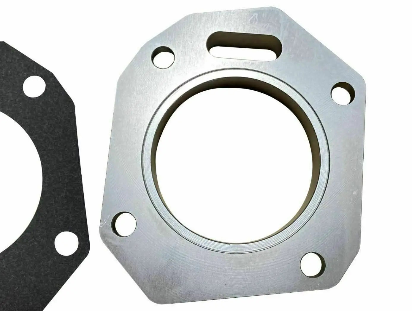 RBC throttle body adapter plate for Honda Acura K20 K24 engines, Jack Spania Racing engine parts on a metallic surface.