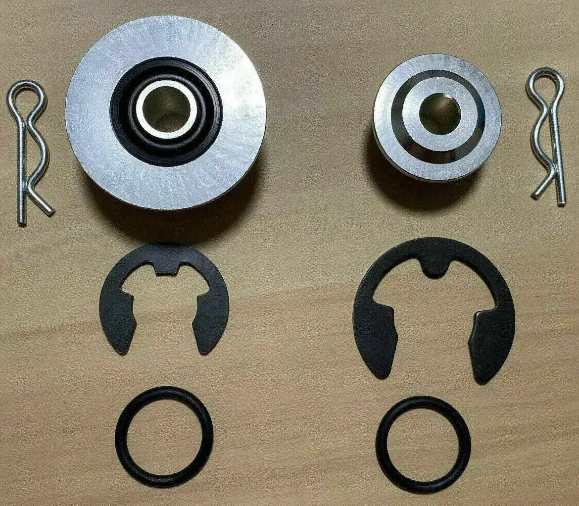 Jack Spania Racing billet spherical shifter cable bushings for OEM K20 K24 DC2 EG EK CRX Si transmission cables.