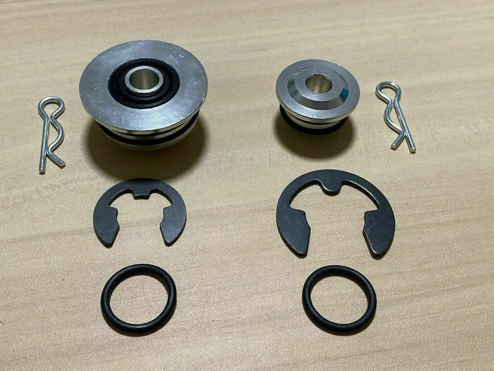 Jack Spania Racing billet spherical shifter cable bushings for OEM K20, K24, DC2, EG, EK, CRX Si transmission cables.