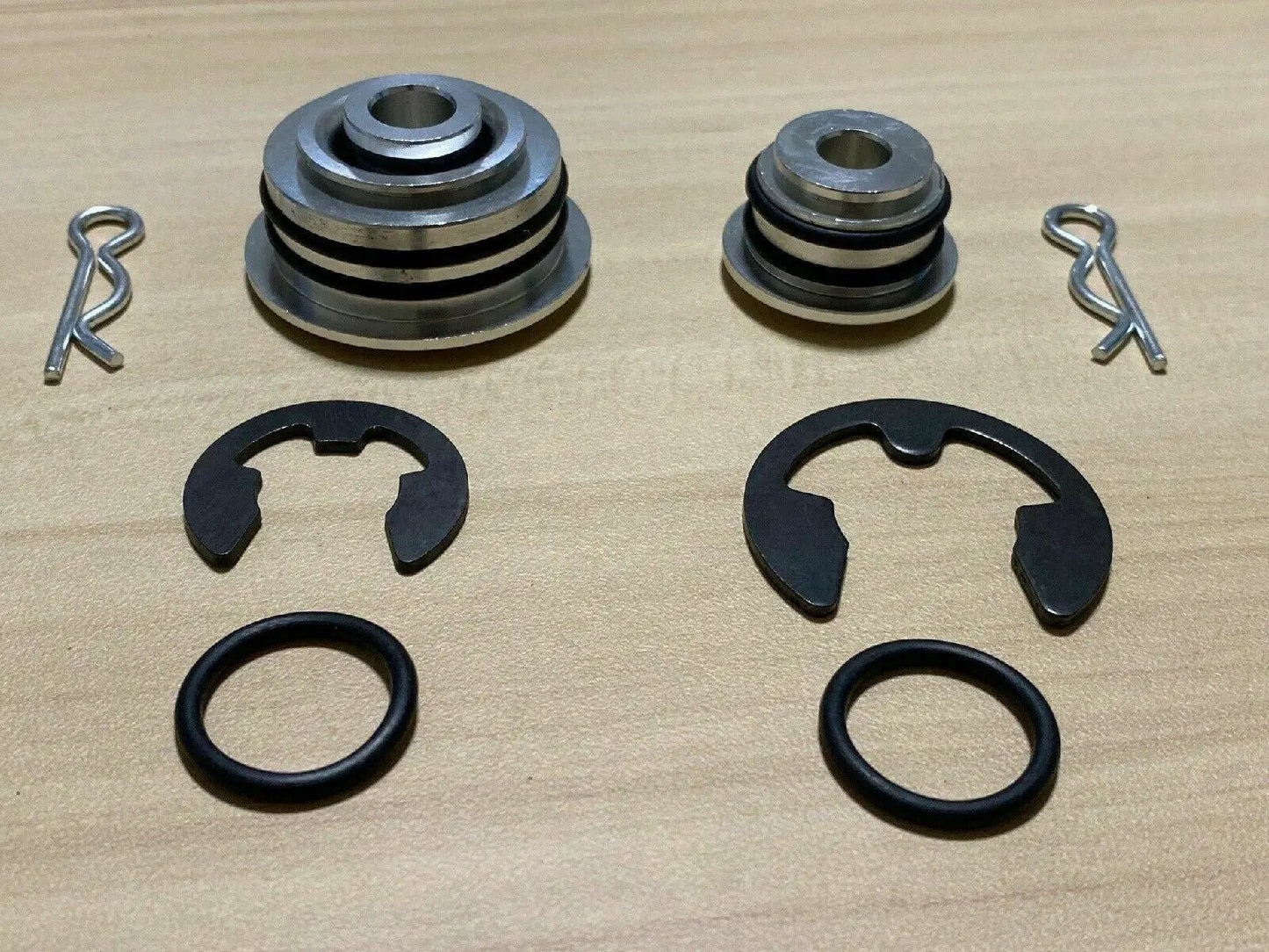 Jack Spania Racing billet spherical shifter cable bushings for OEM K20, K24, DC2, EG, EK, CRX Si transmission cables.