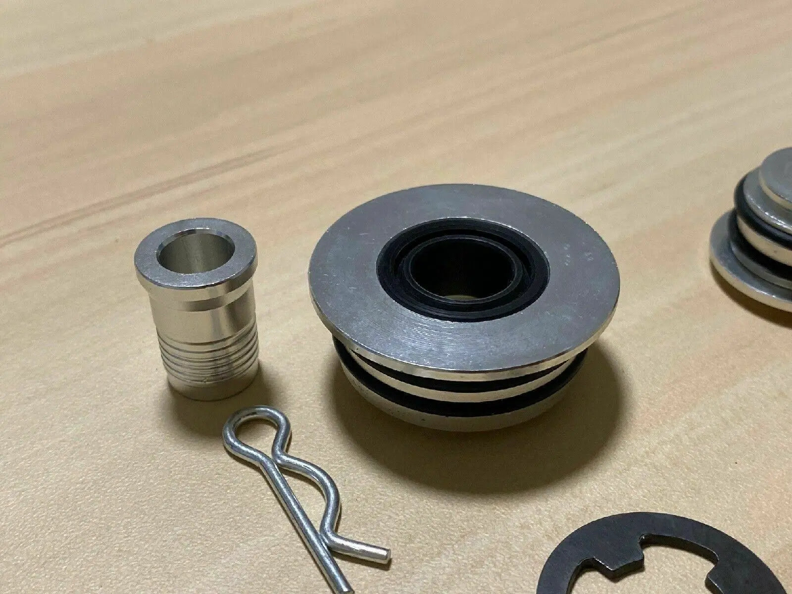 Jack Spania Racing billet spherical shifter cable bushings for OEM K20, K24, DC2, EG, EK, CRX Si transmission cables.