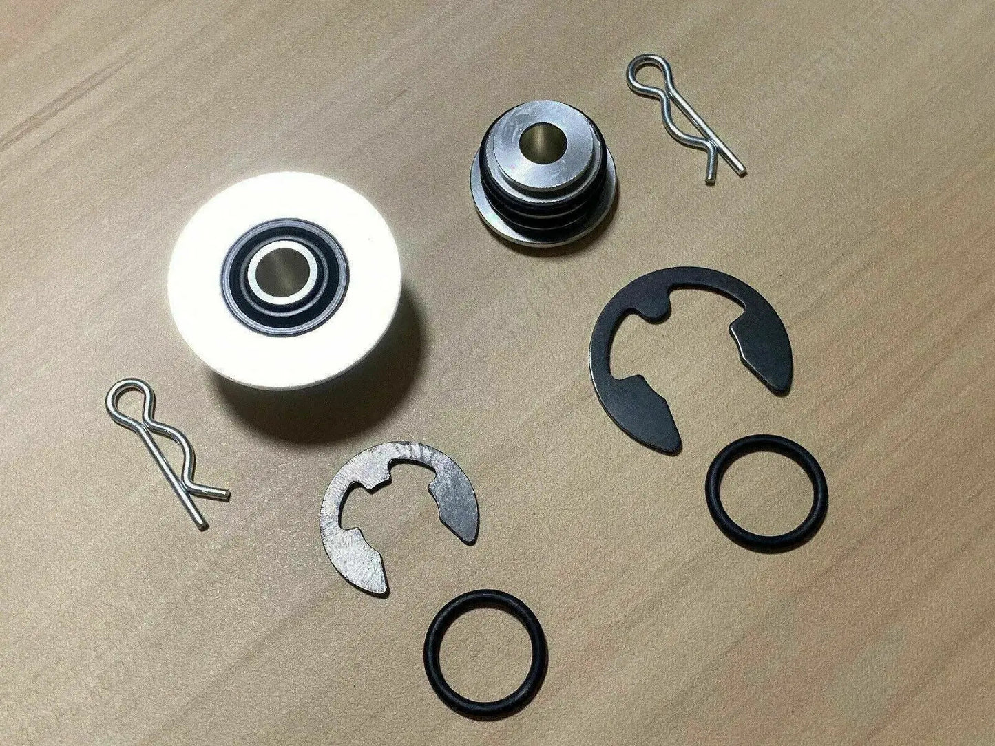 Jack Spania Racing billet spherical shifter cable bushings for OEM K20, K24, DC2, EG, EK, CRX Si transmission cables.