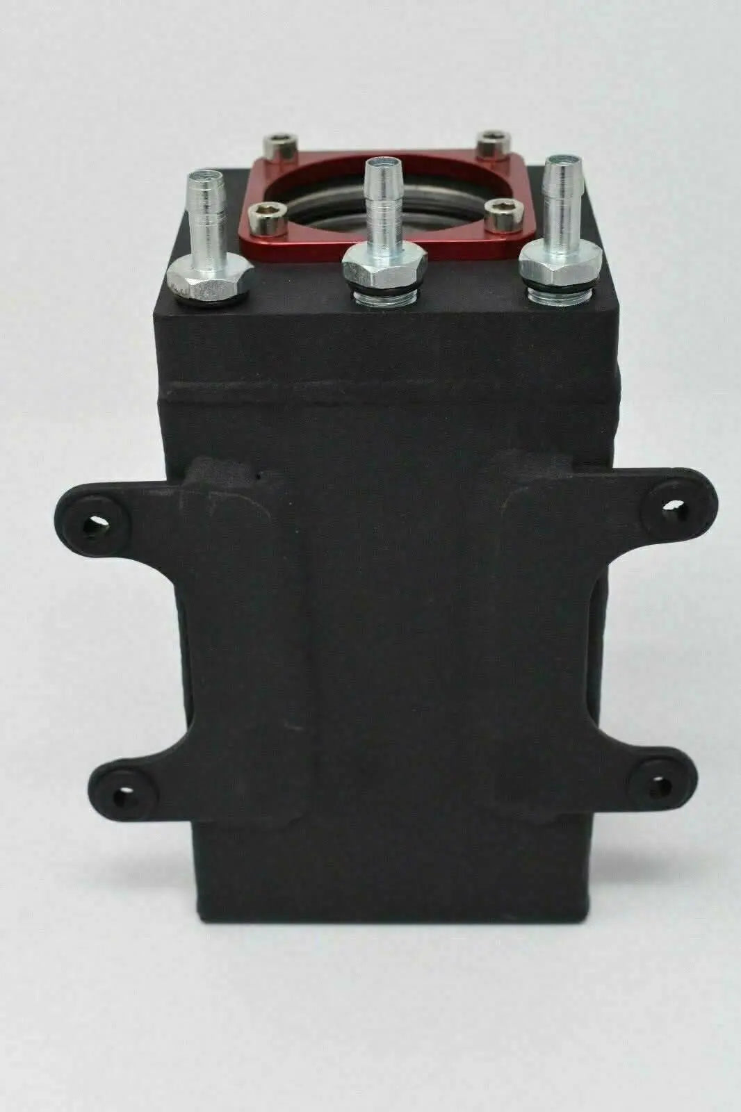 Billet aluminum external fuel pump surge tank for AEM Bosch 044 380LPH E85, by Jack Spania Racing, showing polished metal finish.