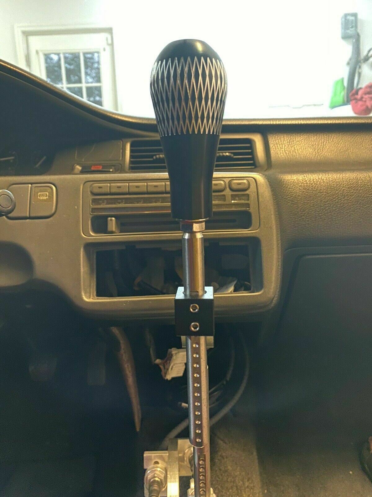 Jack Spania Racing adjustable shifter extender with shift knob, interior car accessory for enhanced gear shifting comfort.