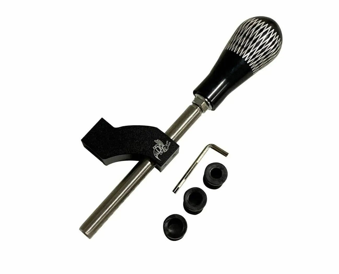 Interior shot of a Jack Spania Racing adjustable shifter extender with shift knob installed in a car's gear shifter area.