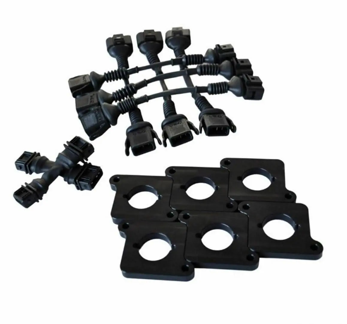 Audi B5 S4 C5 A6 2.7T coil conversion harness CNC plate ICM bypass kit by Jack Spania Racing, showing engine component details.