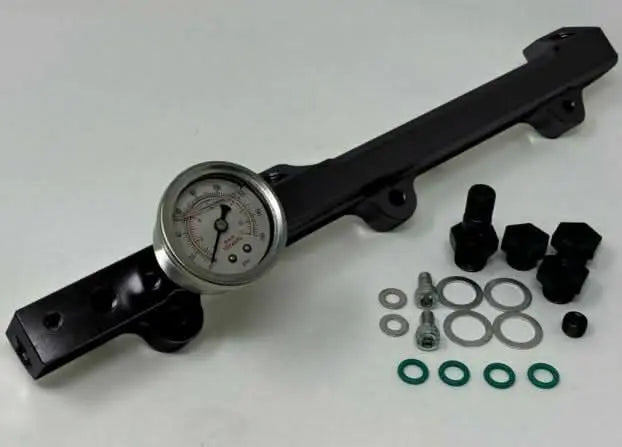 Jack Spania Racing H F Series high flow fuel rail for Honda Prelude H22 H23 and Accord F22 engine parts, with visible metallic finish.