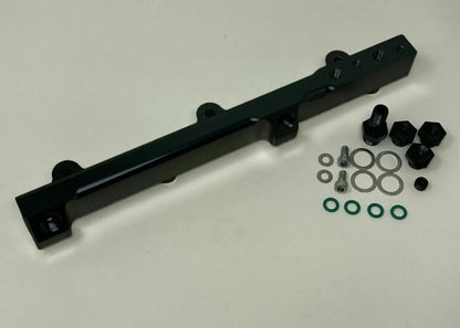 High flow fuel rail for Honda Prelude H22 H23 and Accord F22, by Jack Spania Racing, with engine component details.