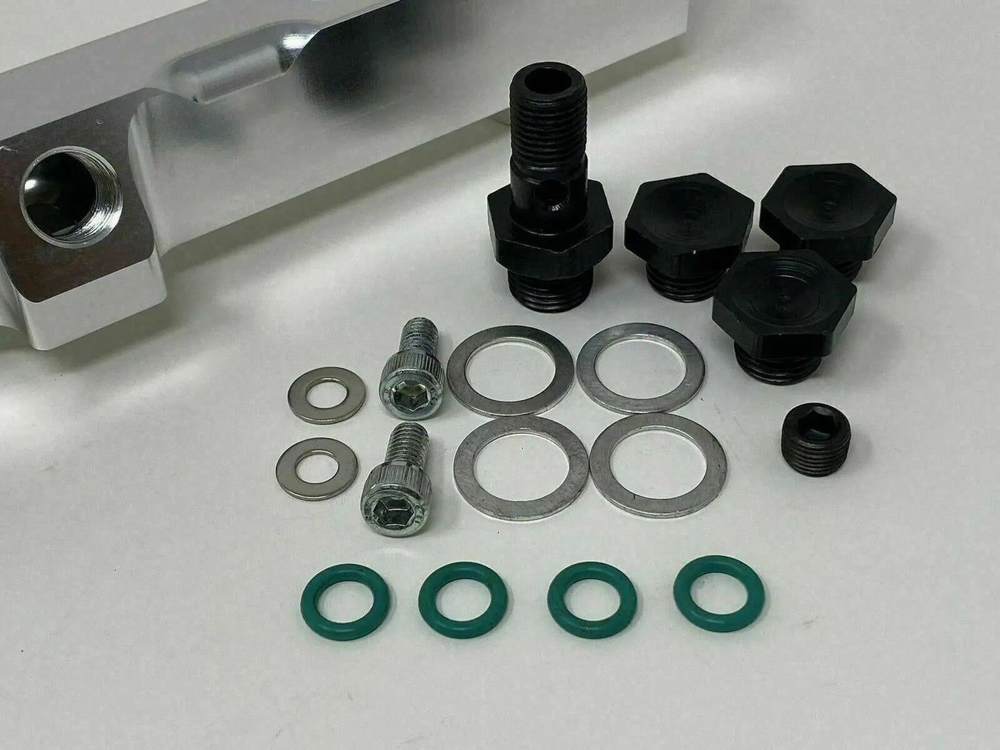High flow fuel rail for Honda Prelude H22 H23 and Accord F22, by Jack Spania Racing, showing the metal fuel rail with fittings.