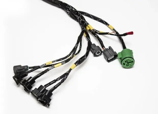 Jack Spania Racing B D H F Series tucked engine harness kit installed in a Honda Acura Prelude, showing detailed wiring and connectors.