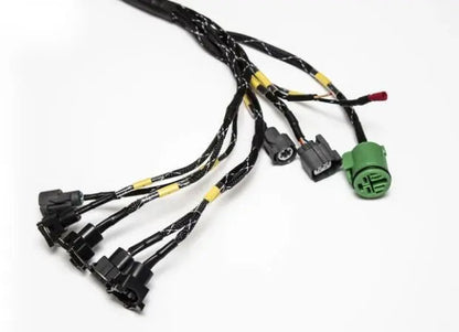 Jack Spania Racing B D H F Series tucked engine harness kit installed in a Honda Acura Prelude, showing detailed wiring and connectors.