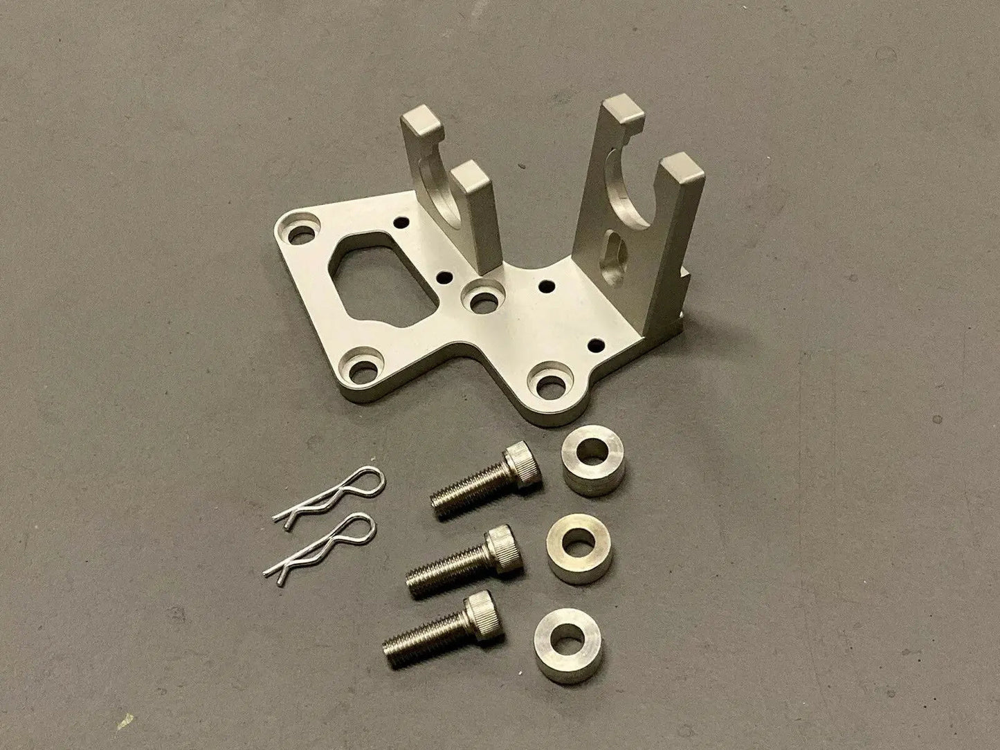 Jack Spania Racing K20 K24 K Series transmission bracket for Honda Integra, CRX, and hatchback K Swap models, durable transmission part.