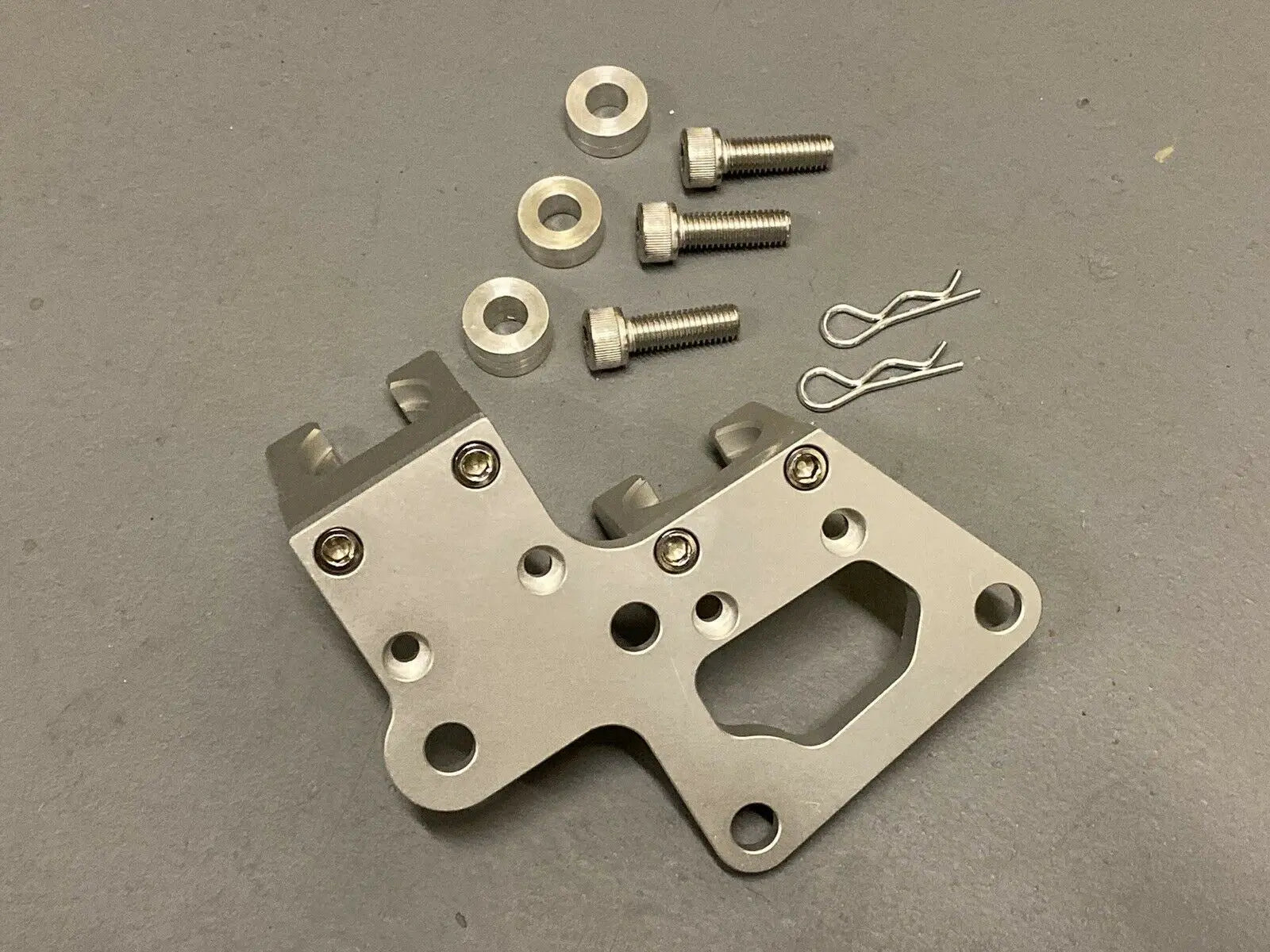 Jack Spania Racing K20 K24 K Series transmission bracket for Honda Integra, CRX, and hatchback K swap models.