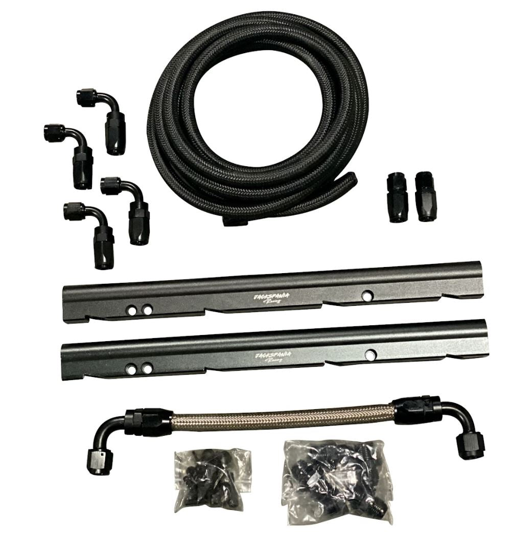 Jack Spania Racing billet LS feed return fuel rail kit for GM LS3 V8 engine with AN6 and AN8 fittings, mounted on OE intake manifold.