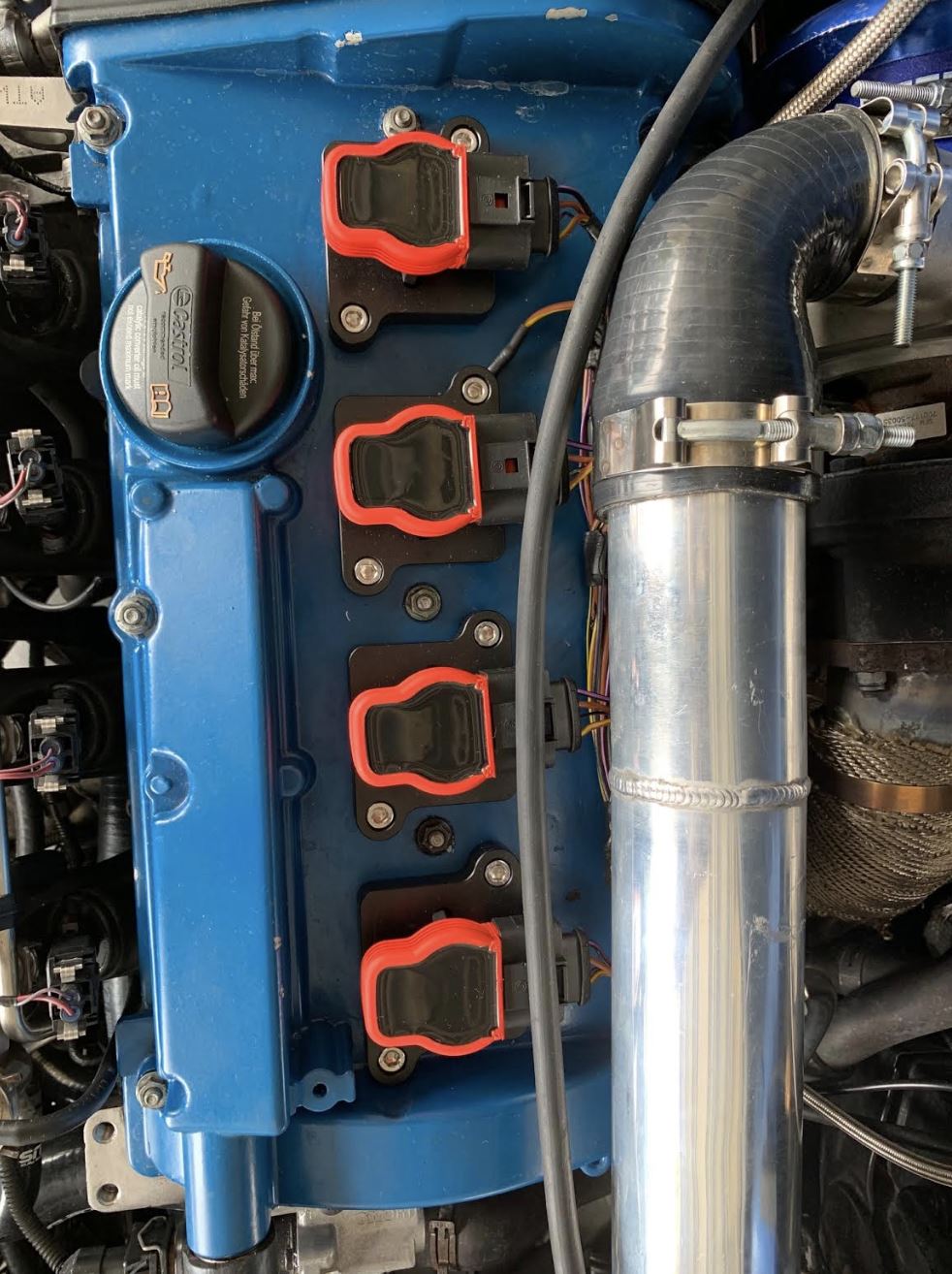 Audi 2.0T coil conversion ICM bypass kit with R8 coilpack plates for 97-99.5 B5 A4 1.8T engines, by Jack Spania Racing.