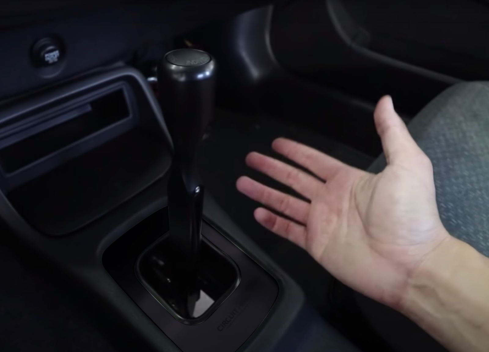 Interior view of a Jack Spania Racing center shifter console cover plate boot for Acura Integra Type R 94-01 DC2, showing detailed stitching.
