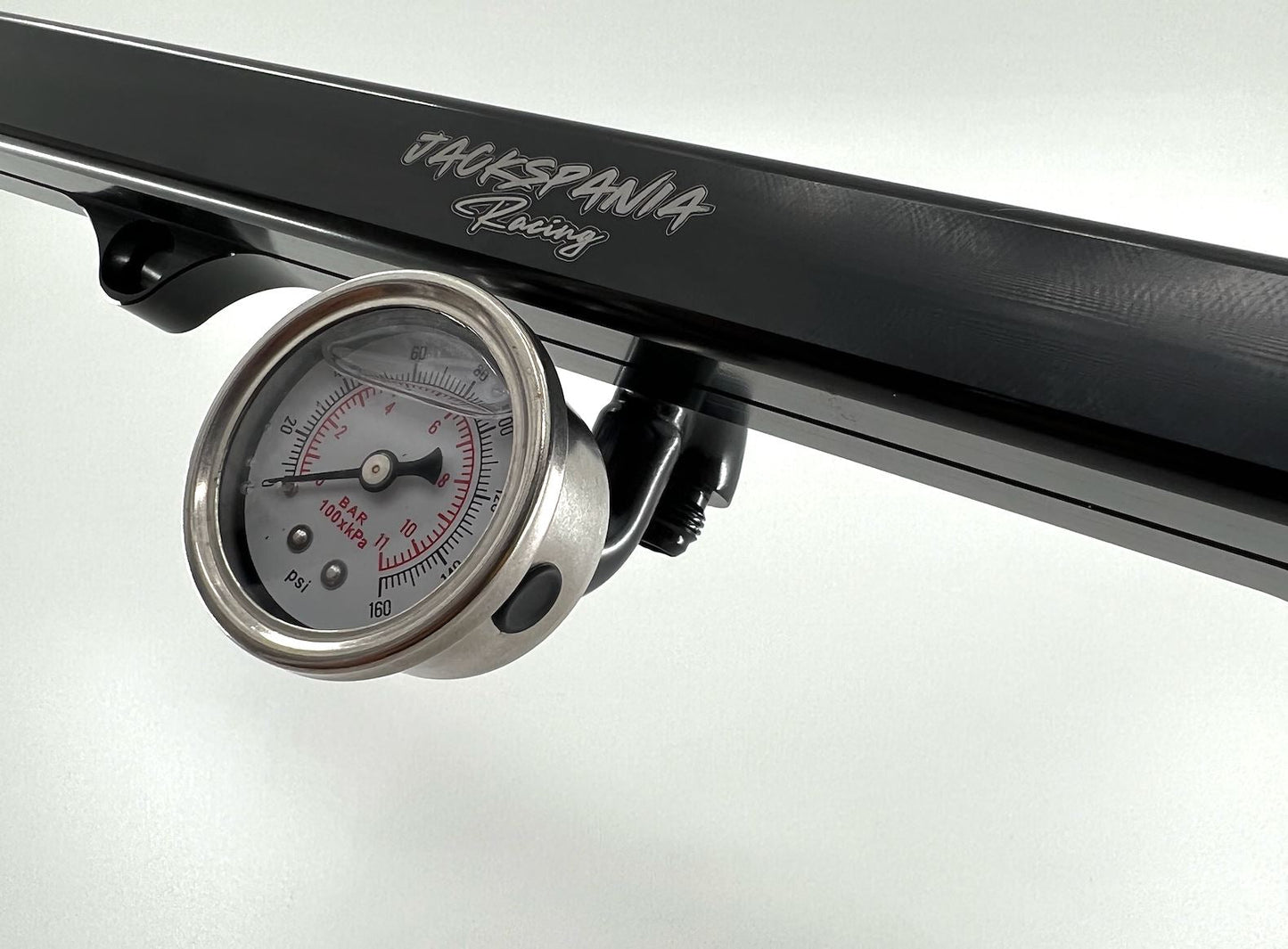 Jack Spania Racing K Series center mount fuel gauge with AN6 fitting for K Tuned fuel rail on K20 and K24 engines.