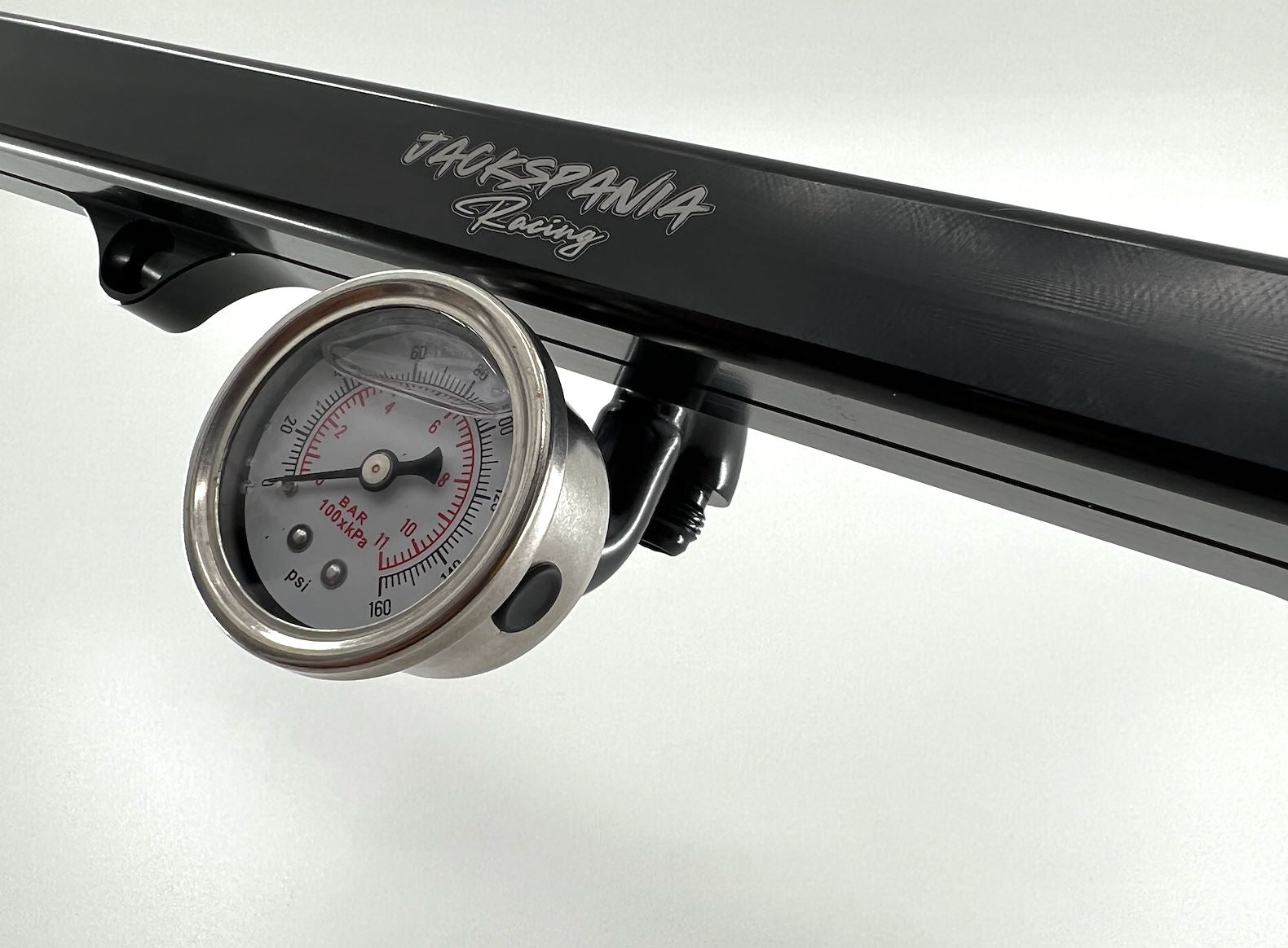 Jack Spania Racing K Series center mount fuel gauge with AN6 fitting for K Tuned fuel rail on K20 and K24 engines.