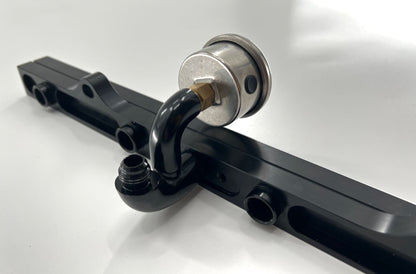 Jack Spania Racing center mount fuel gauge with AN6 fitting for K Tuned K Series fuel rail on K20 and K24 engines.