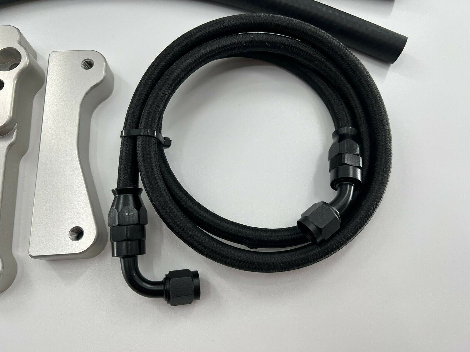 Power steering relocation kit for Honda Acura RSX 02-04, compatible with K swap, from Jack Spania Racing, includes suspension parts.