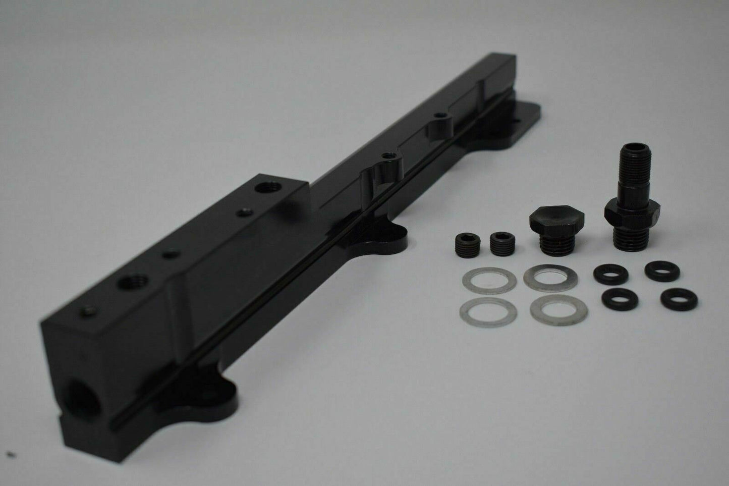 Fuel pressure regulator gauge rail for Honda Acura B D Series engines, by Jack Spania Racing, showing the regulator and gauge components.