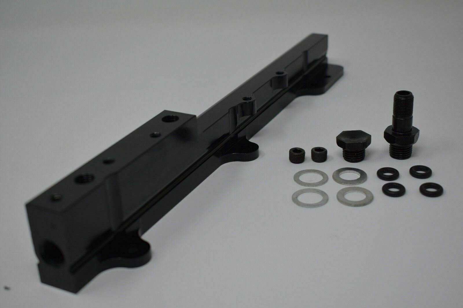 Fuel pressure regulator gauge rail for Honda Acura B D Series engines, by Jack Spania Racing, showing the regulator and gauge components.