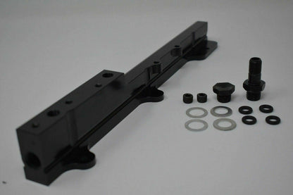 Fuel pressure regulator gauge rail for Honda Acura B D Series engines, by Jack Spania Racing, showing the regulator and gauge components.