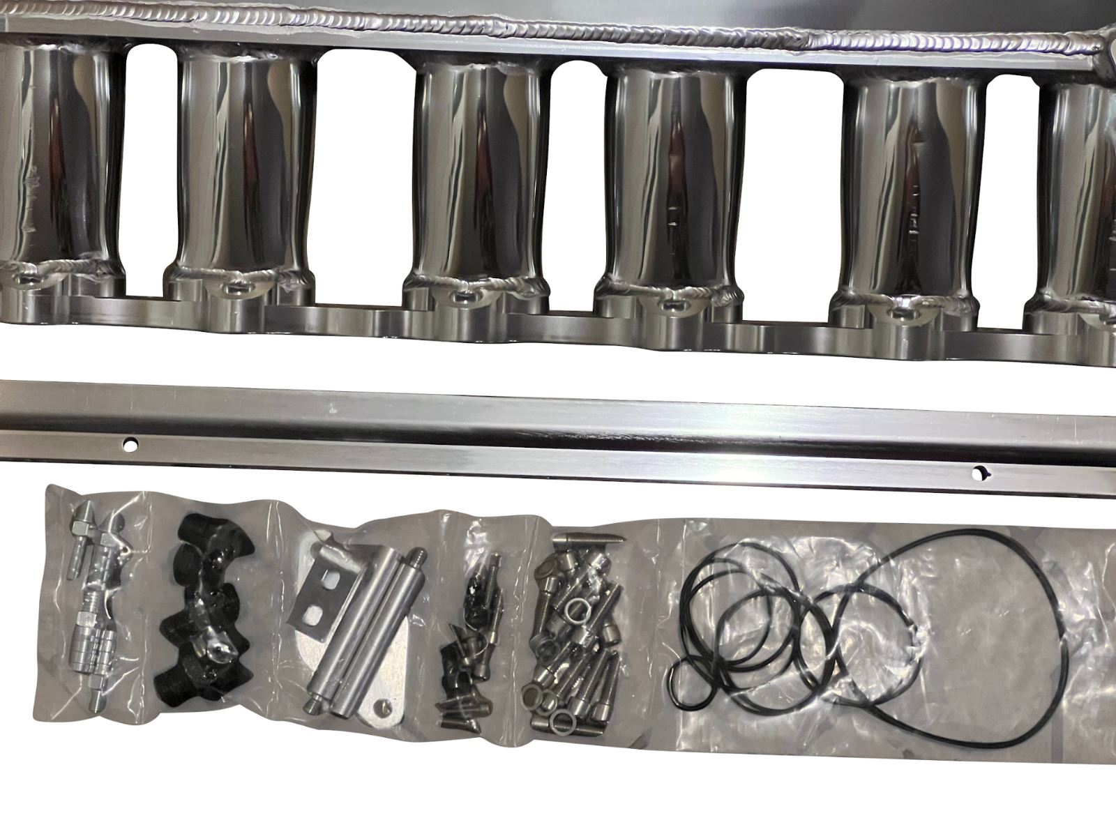 Jack Spania Racing 2JZ-GTE billet intake manifold with fuel rail and 90mm throttle body for Supra 2J swap engine parts.