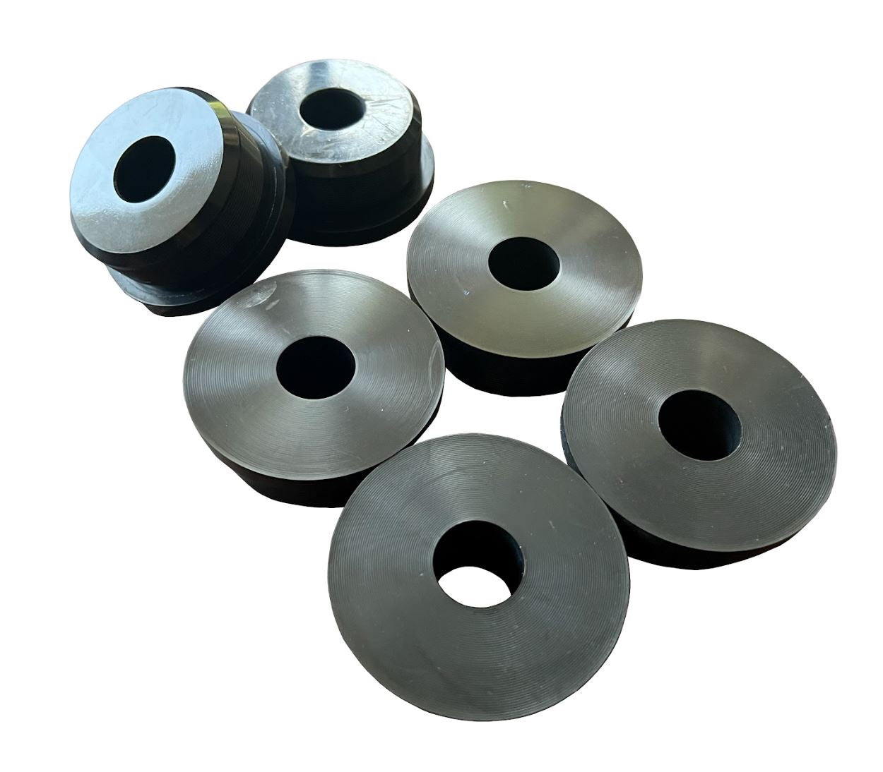 Set of six Jack Spania Racing poly engine mount bushings for Honda Civic and CR-V suspension, designed for improved stability.