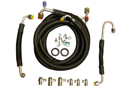 Jack Spania Racing D Series AC Line Tuck Kit installed in Honda Civic Si and Acura Integra DC2 engine bay with engine parts.