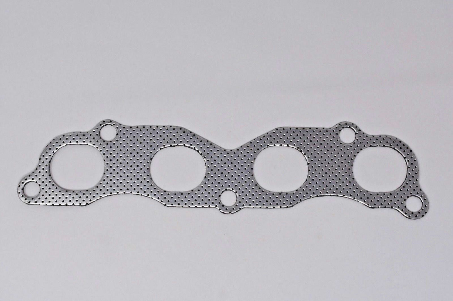Jack Spania Racing graphite exhaust manifold gasket for Acura Honda K20 K24 K Series EP3 Type S TL TSX engines.