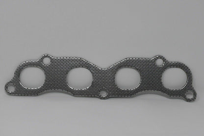 Jack Spania Racing graphite exhaust manifold gasket for Acura Honda K20 K24 K series engine, suitable for EP3 Type S, TL, TSX models.