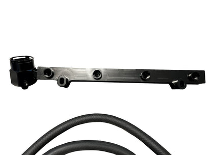 Jack Spania Racing billet aluminum high flow fuel rail upgrade kit for VW Audi 1.8T Golf A4 engine, showing polished fuel rail with fittings.